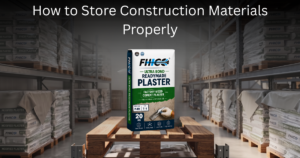 Proper storage of FHICO construction materials on raised platforms in a dry, covered area.